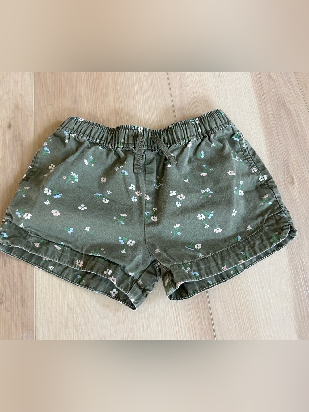 Girls Green floral shorts - size 7